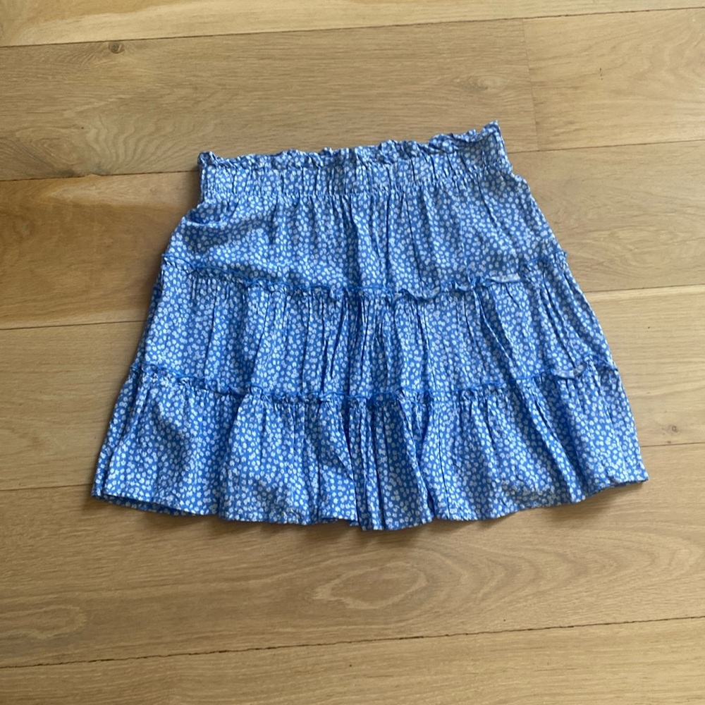 a blue and white flower skirt